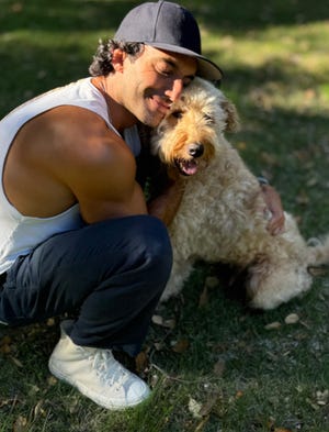 Justin Baldoni and his dog, Happy.