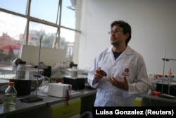 Andre Josafat Riveros, professor at the Faculty of Natural Sciences of the Universidad del Rosario, speaks during an interview with Reuters in Bogota, Colombia, October 17, 2024. (REUTERS/Luisa Gonzalez)
