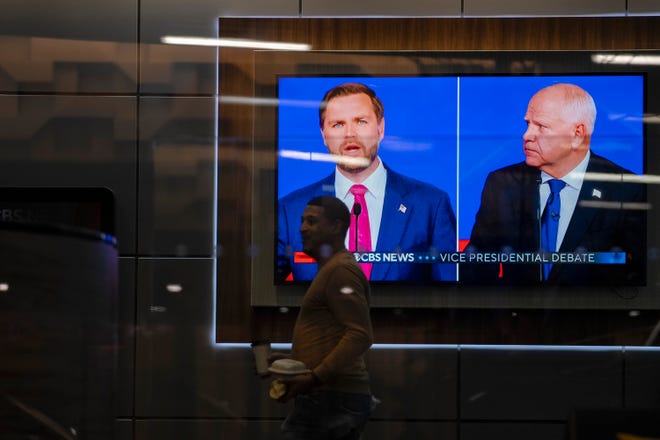 A man walks through CBS Broadcast Studios lobby during the vice presidential debate between Republican JD Vance and Democrat Tim Walz.