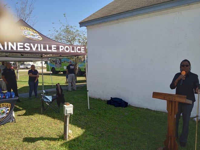 Angela Howard speaks about living with sickle cell disease during the Community Health Fair presented by Impact Duval on Saturday at Bartley Temple United Methodist Church.
