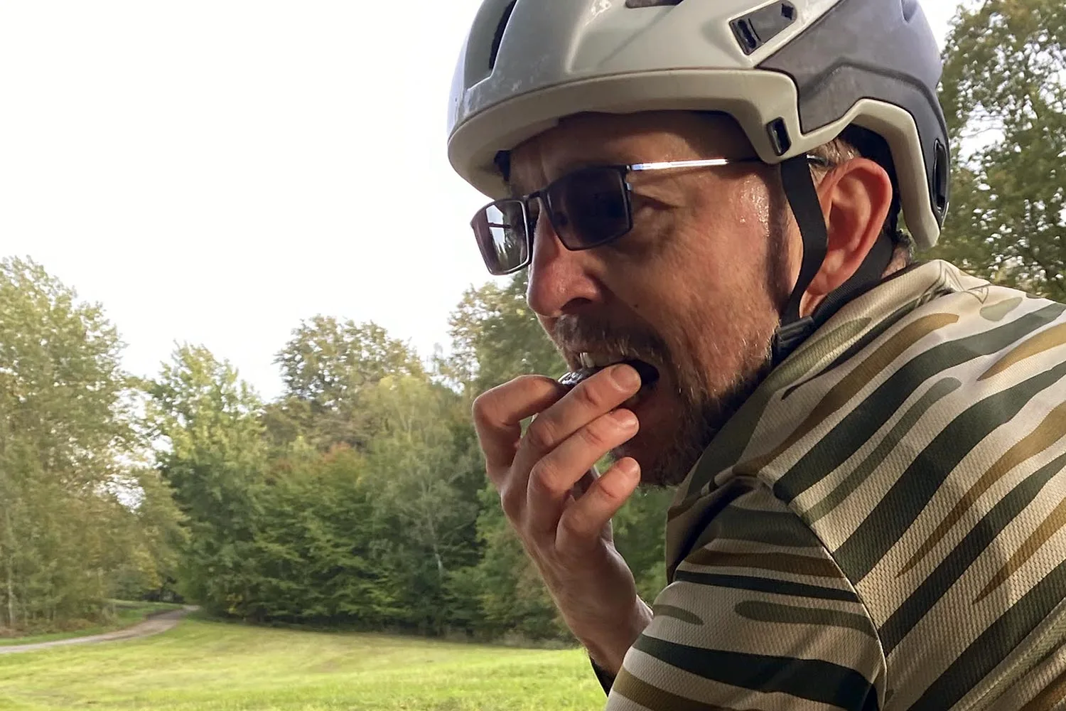 Chimpanzee Super Bars natural fruit & nut sports nutrition energy bars with 100mg of guarana caffeine, eating bars on a bike