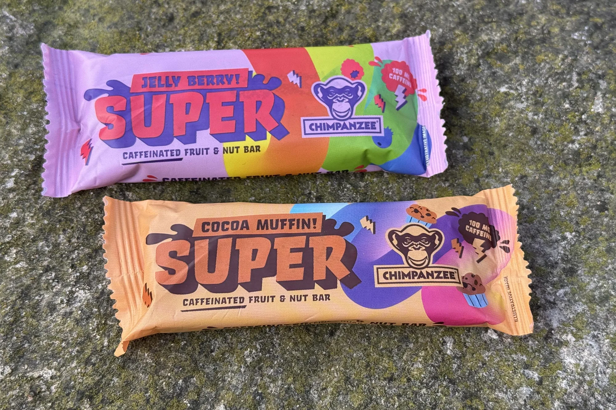 Chimpanzee Super Bars natural fruit & nut sports nutrition energy bars with 100mg of guarana caffeine, bars on a rock