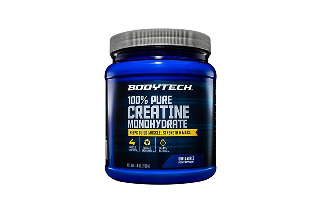 A blue plastic container with white text labeled creatine