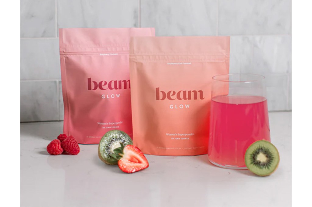 A group of bags filled with fruit and a drink