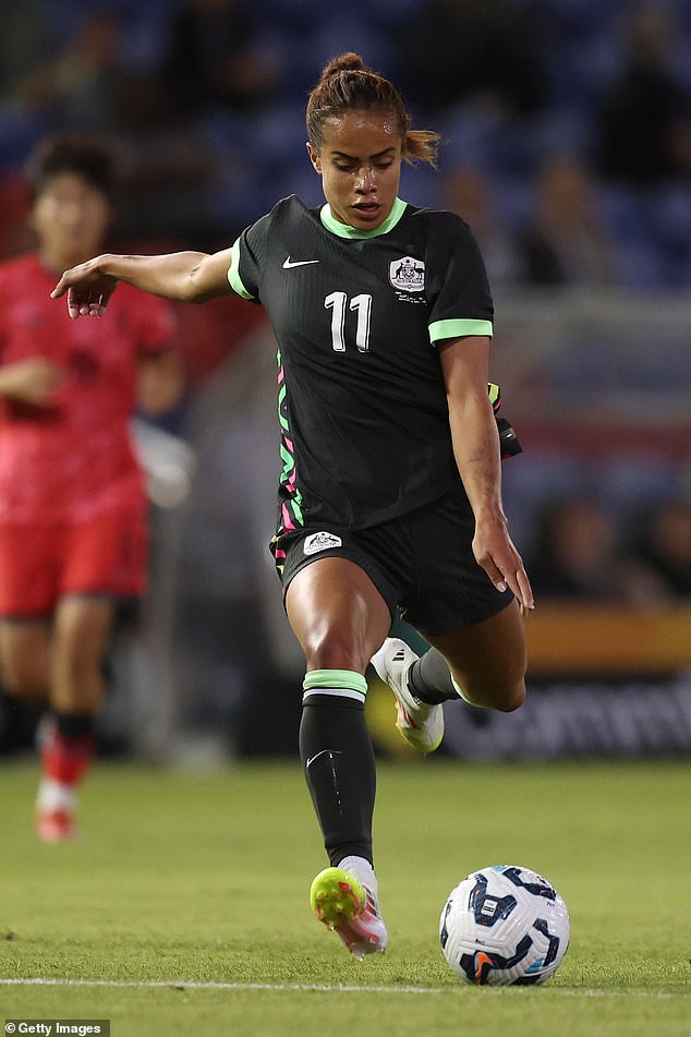 The Queensland-born forward (pictured playing for the Matildas in April) is currently sidelined while she recovers from a serious knee injury