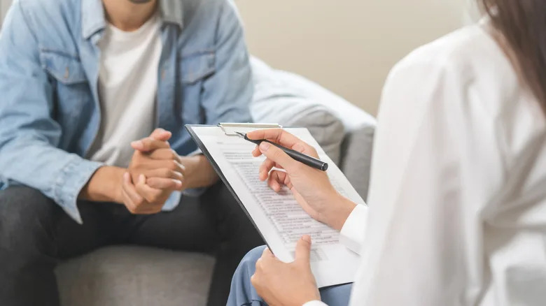 a man seeing a therapist