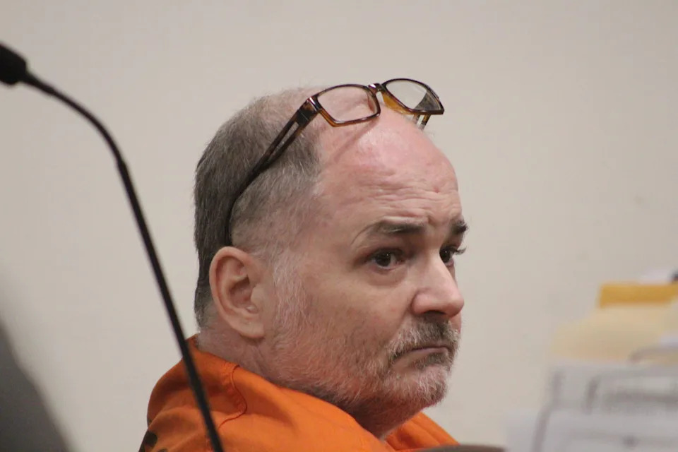 Travis McBride, a mental health counselor who is charged with first-degree murder in the killing of a homeless man in DeLand, appears in court on Sept. 11, 2025, for a hearing in Daytona Beach.