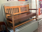 A wooden bench prop used in the 1975 film "One Flew Over the Cuckoo's Nest" at the Oregon State Hospital Museum of Mental Health in Salem, Ore., on Oct. 22, 2025.