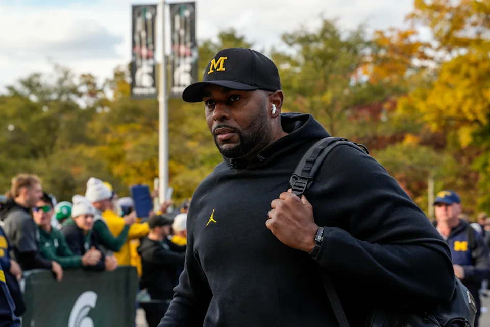 Oct 25, 2025; East Lansing, Michigan, USA; University of Michigan head coach Sherrone Moore walks into Spartan Stadium before a game against the Michigan State Spartans. Mandatory Credit: Brendan Mullin-Imagn Images