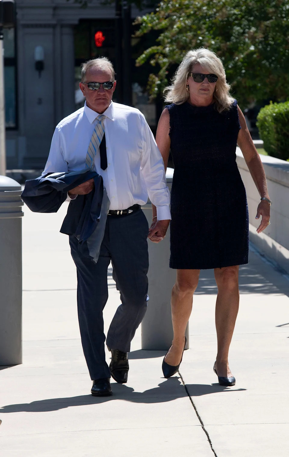 Bruce and Pam Childers arrive on at the U.S. Court House in downtown Pensacola on Sept. 23, 2025.