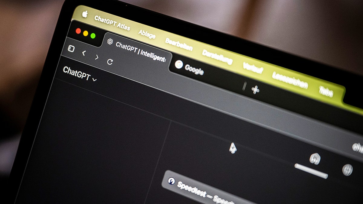 Laptop open to a ChatGPT screen.