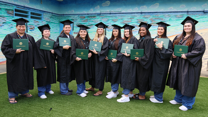 W C C C mental health technician graduates in cap and gown