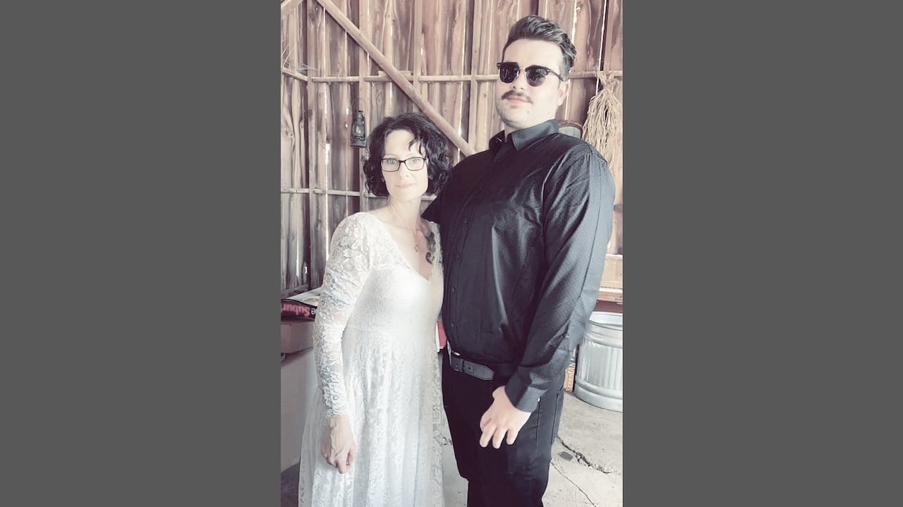 A mother and her adult son.