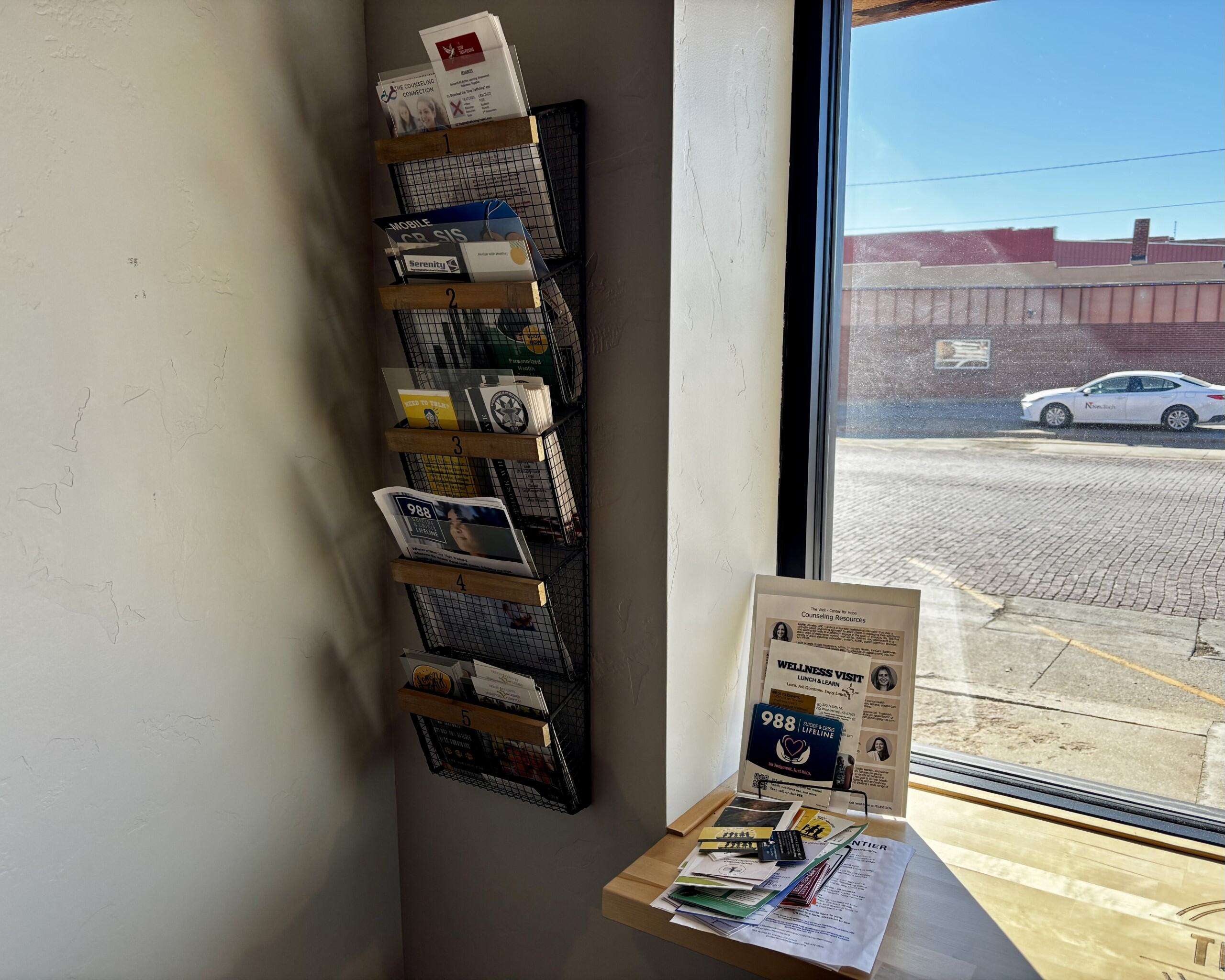 A corner full of pamphlets and resources at The Well-Center for Hope. Photo by Tony Guerrero/Hays Post
