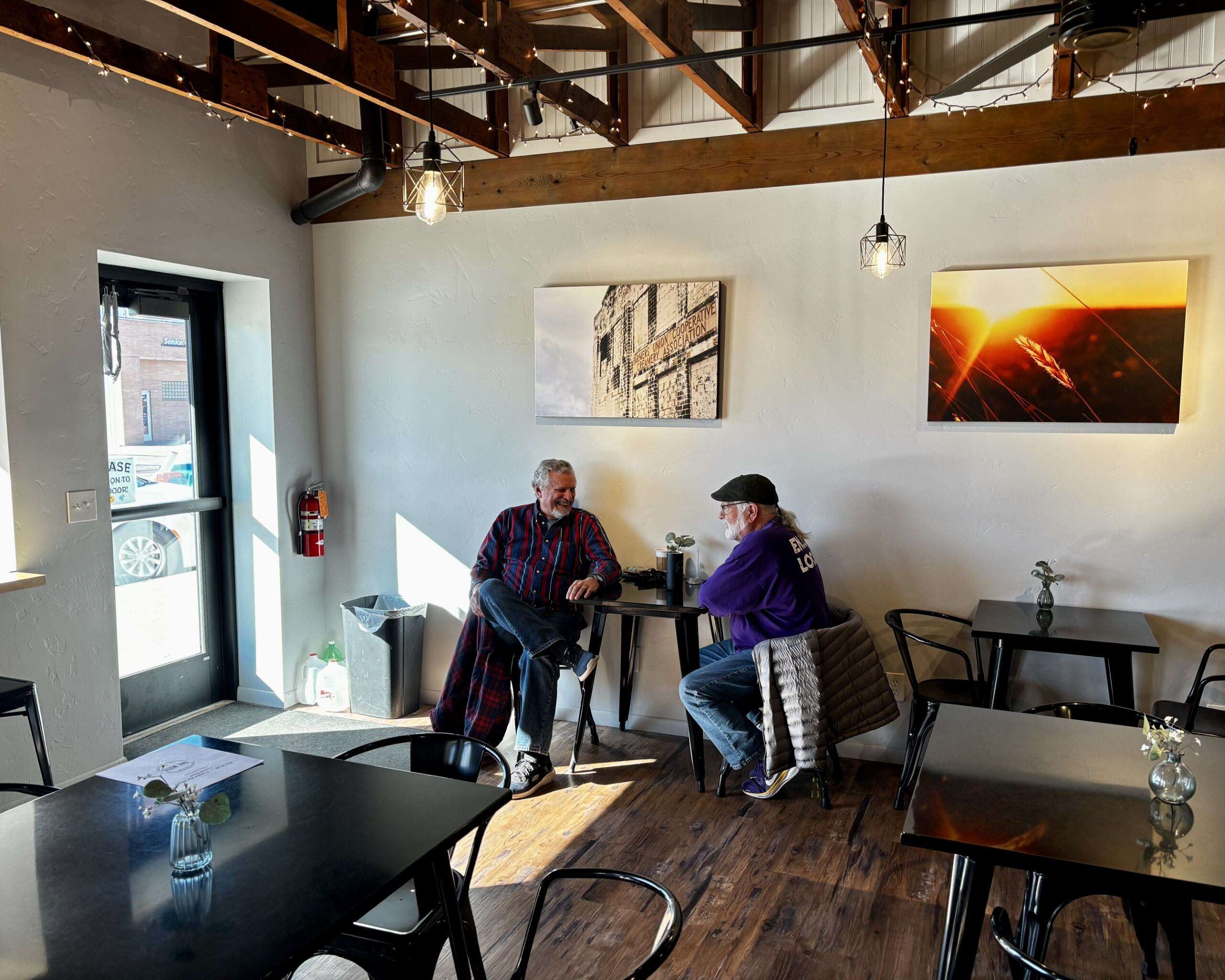 Two customers talking at The Well-Center for Hope in WaKeeney. Photo by Tony Guerrero/Hays Post