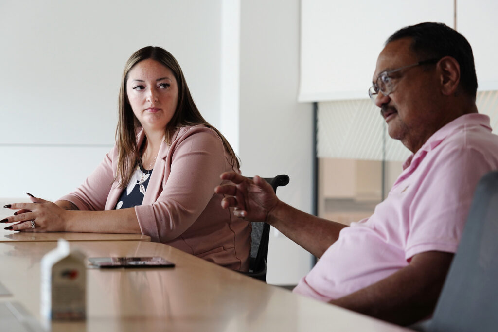 Christin Johnson, left, looks on as Mark Patterson answers a question during an ed board meeting Tuesday, Nov. 4, 2025, in Honolulu. They are leaders of the Hawaii Correctional System Oversight Commission. (Kevin Fujii/Civil Beat/2025)