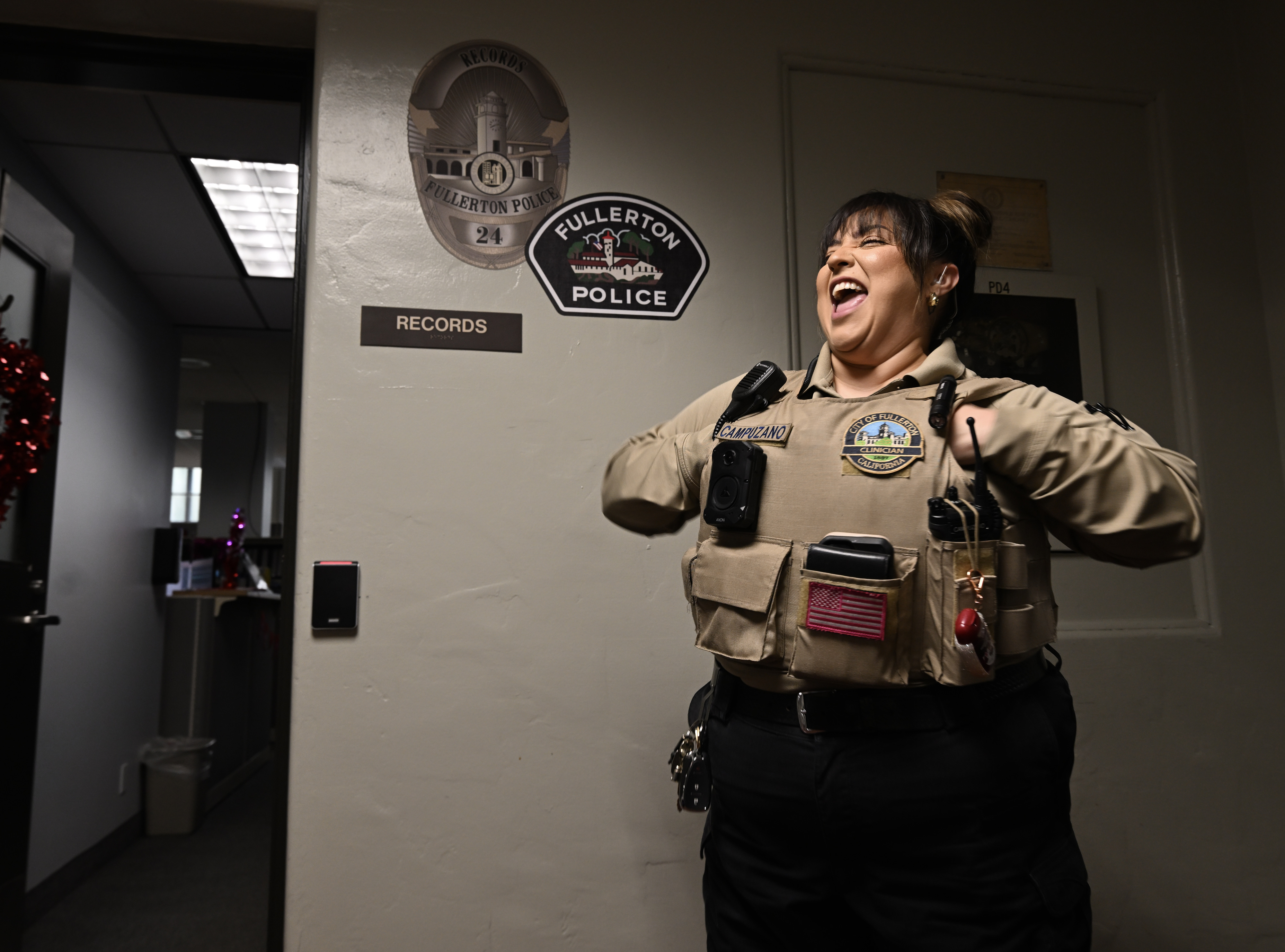 Fullerton police department behavioral health clinicianÂ MaricellaÂ Campuzano shares a laugh with...