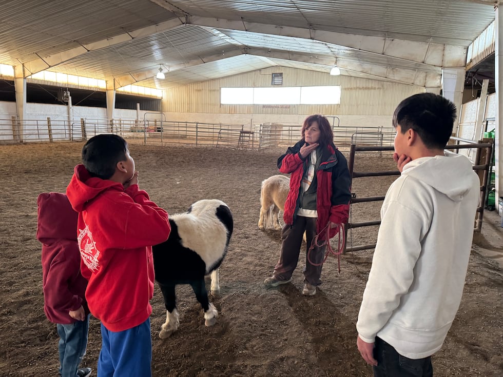 Bridget Williams works with children during a group therapy session at Red Horse Healing in...