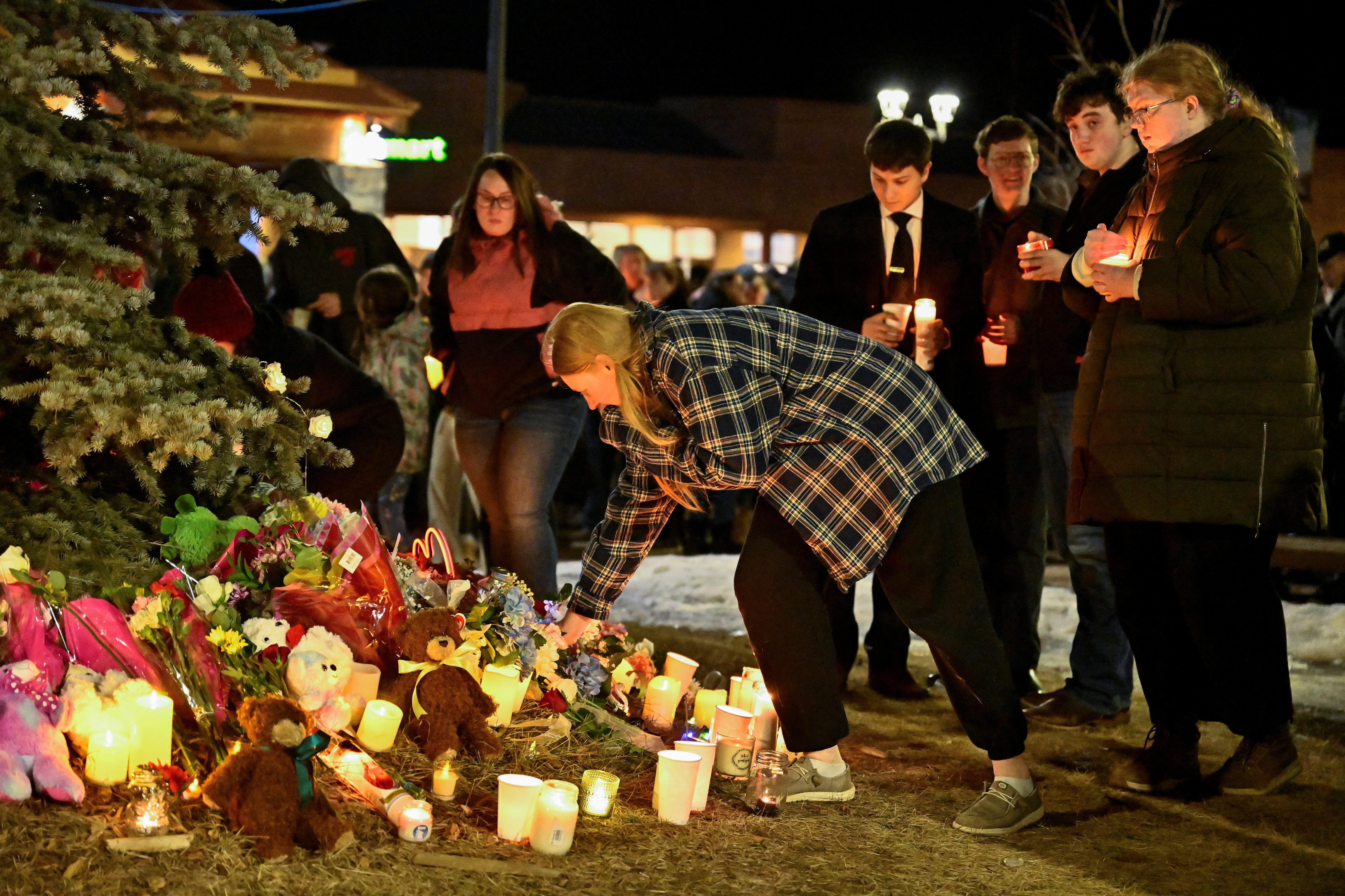 A candlelit vigil was held to honor the shooting victims