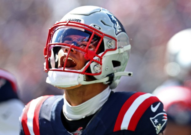 Patriots cornerback Christian Gonzalez reacts after catching an interception during the first quarter of an Oct. 6 game at Gillette Stadium. (Nancy Lane/Boston Herald, File)