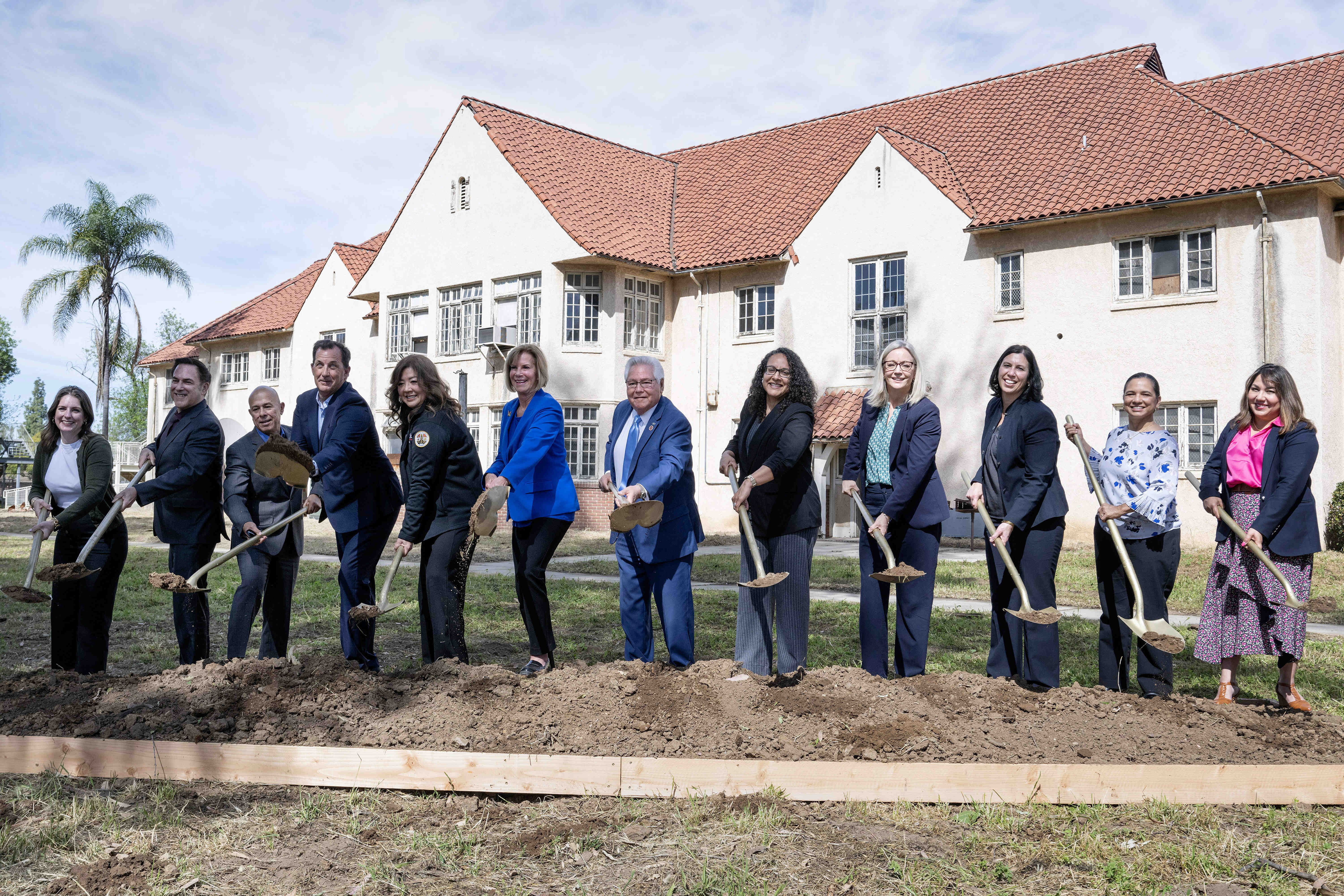 City, county and state leaders celebrate the groundbreaking of a...
