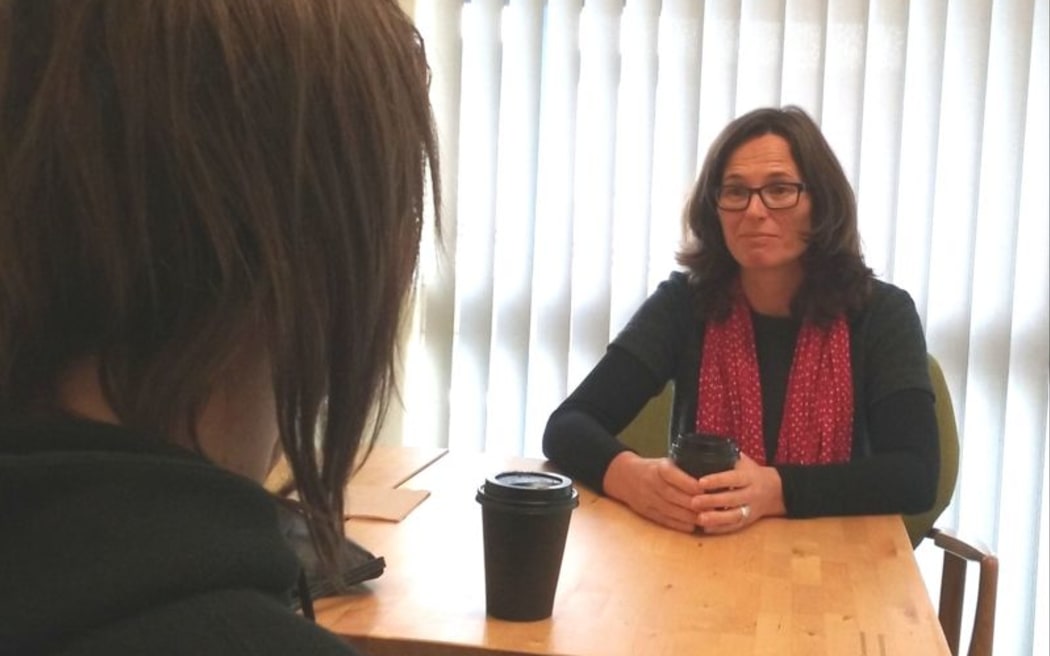 Shae Ronald of Youthline talks to Pop Up Health Clinic client Olivia