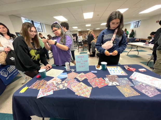 High School students make paper cranes at last year's NAMI Main Line Mental Health Summit. Teens can attend this year's Mental Health Summit in Havertown and discover resources, participate in discussion groups and more. (COURTESY OF LISA PARKER)