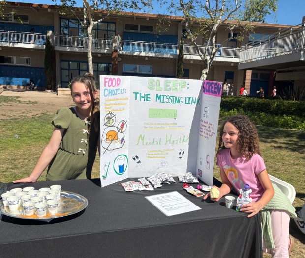 La Jolla Country Day School fifth-graders Delaney Hales and Hazel McDooling made a poster with two other students about sleep and other factors and how they can affect mental health. (La Jolla Country Day School)
