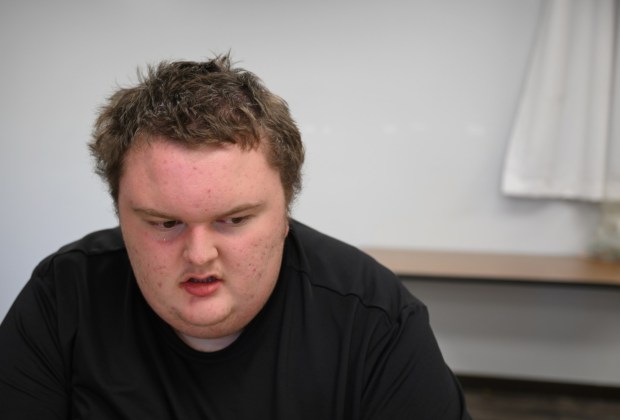 Ethan Ortengren, 18, who has autism, takes a break from assembling a Lego set during therapy at Seven Dimensions Behavioral Health in Evergreen, Colorado, on March 16, 2026. (Photo by RJ Sangosti/The Denver Post)