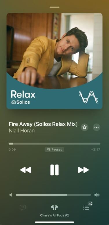 A screenshot of the Apple Music player, showing the song 