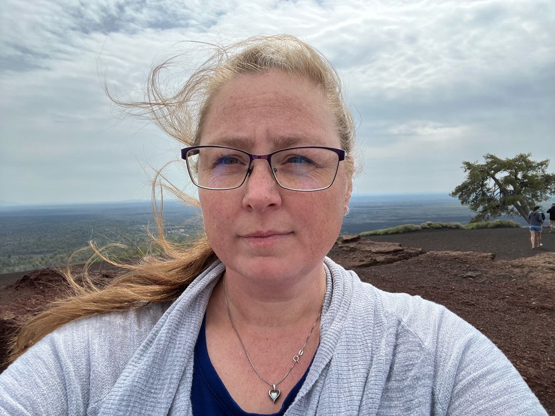 Katrina Lewis, who is pictured at Craters of the Moon National Park in Idaho, has participated in two psilocybin retreats. She has found some relief from her depression, but the full effects haven't lasted.