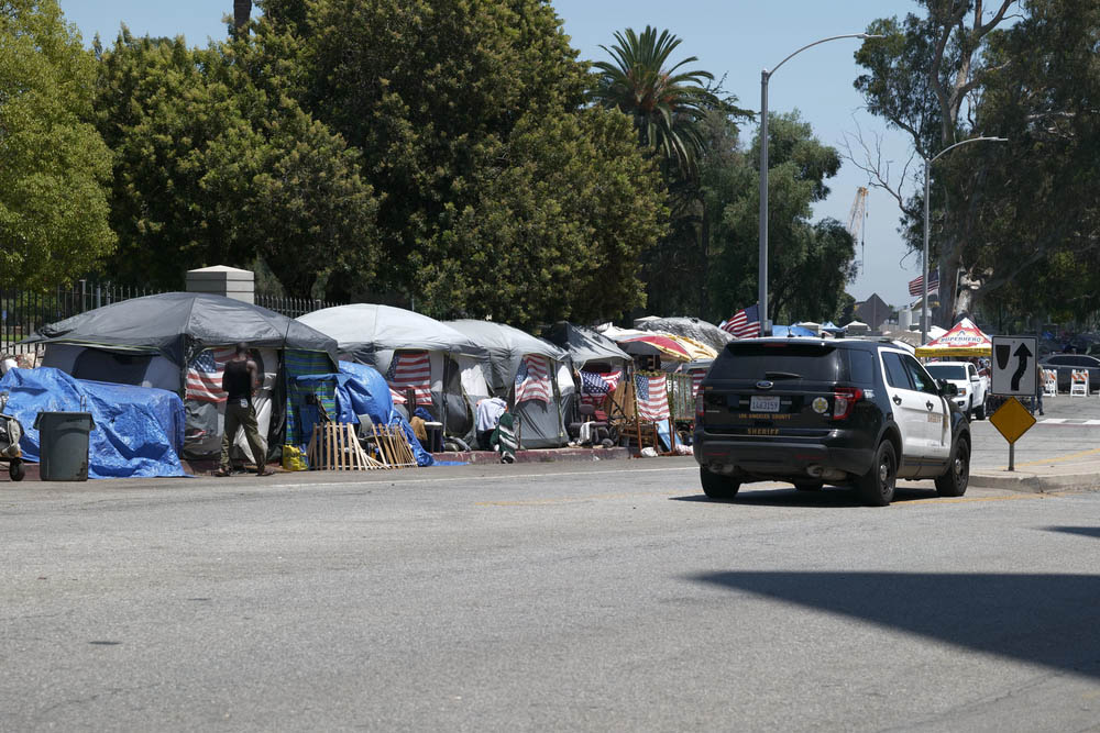 Los Angeles, CA USA - Julyl 3, 2021: Homeless tents outside the Veterans Administration in a stretch called Veterans Row