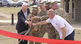 Link to Video: Military personnel ribbon cutting