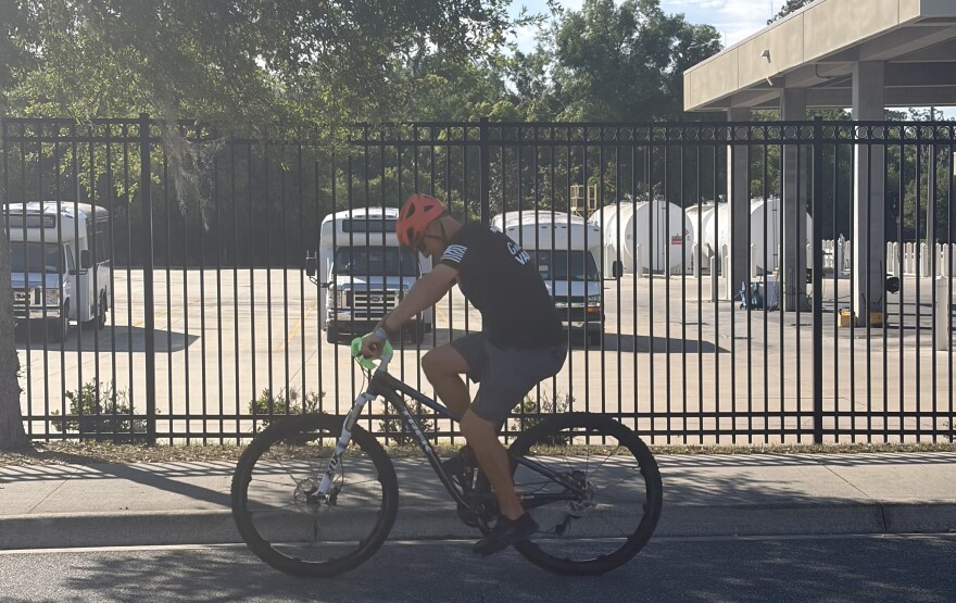 A biker on his way to the Hawthorne Trail on Saturday, April 11, 2026, as part of the Gainesville Opportunity Center’s annual Bike Day. (Ciara Carle/WUFT News)