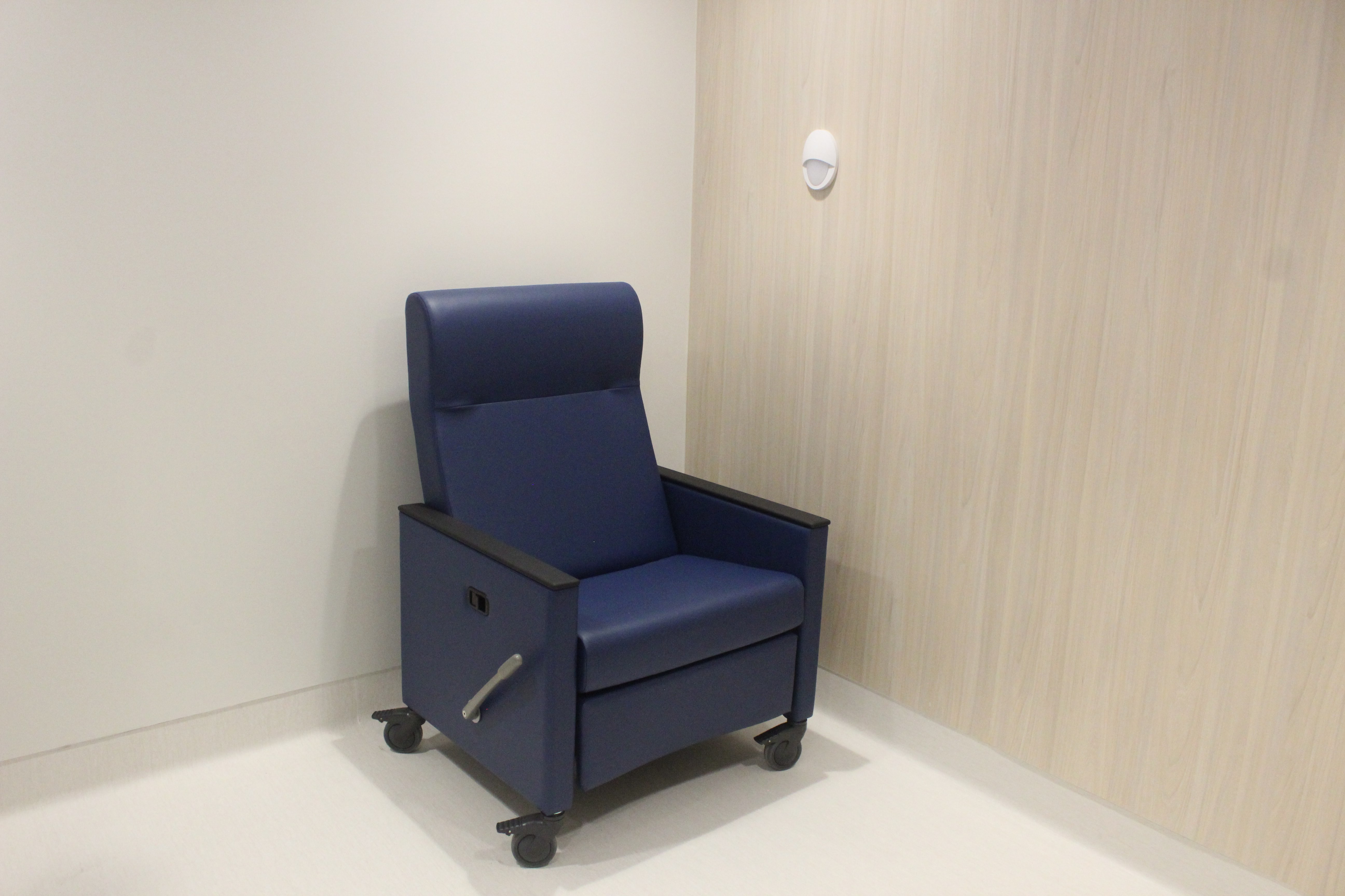 Sobering room at the Crisis Intervention Center. These rooms also have a TV and bathroom. Sobering patients only stay 23 hours so the rooms do not have beds. Photo by Cristina Janney/Hays Post