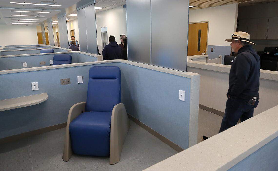 Community members take a tour through the Columbia Valley Center for Recovery in downtown Kennewick following a grand opening and ribbon cutting ceremony.