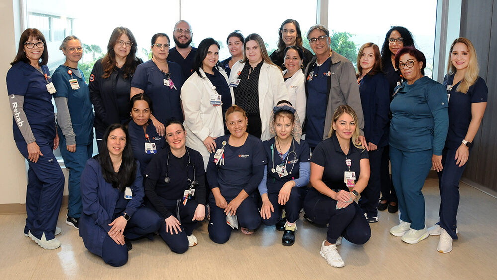 HCA Florida Mercy Hospital inpatient rehab colleagues smiling for a picture 