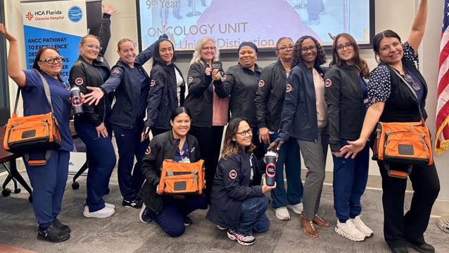 HCA Florida Osceola Hospital oncology colleagues smiling for picture 
