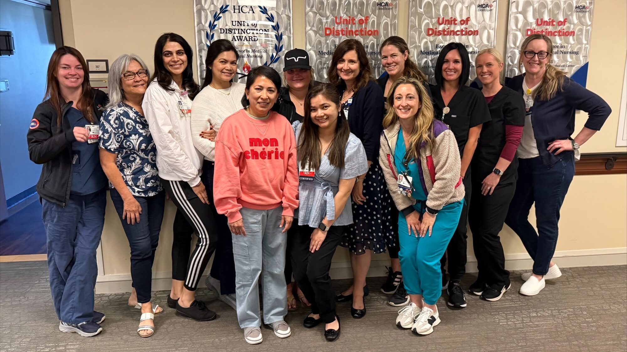 More than a dozen Los Robles Regional Medical Center colleagues smiling for a group picture. 