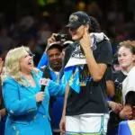 ESPN reporter Holly Rowe speaks to UCLA Bruins center Lauren Betts (51) on the podium after the win against the South Carolina Gamecocks in the National Championship game of the women's 2026 NCAA Tournament at Mortgage Matchup Center.