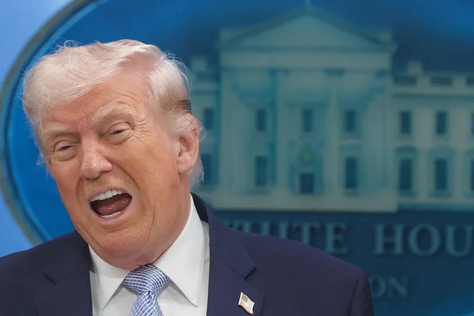 A public figure speaking animatedly at a White House briefing room podium