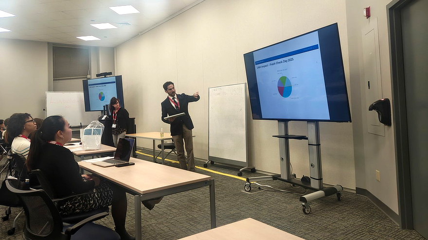 Deborah List and Nick Marinelli give a presentation