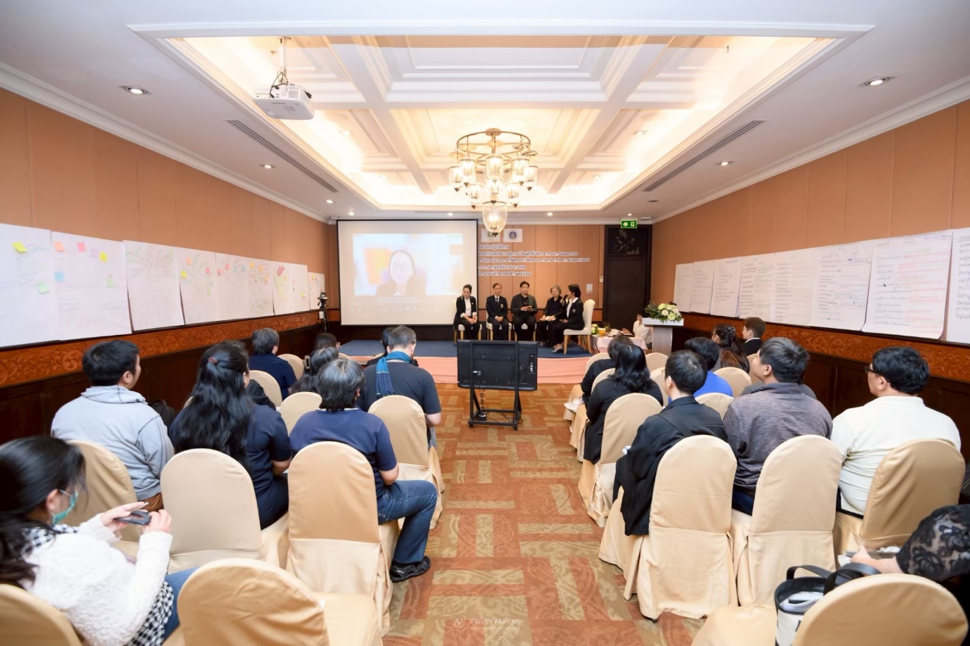 A panel discussion with representatives from WHO, Mahidol University, Department of Mental Health, NHSO, and PWL
