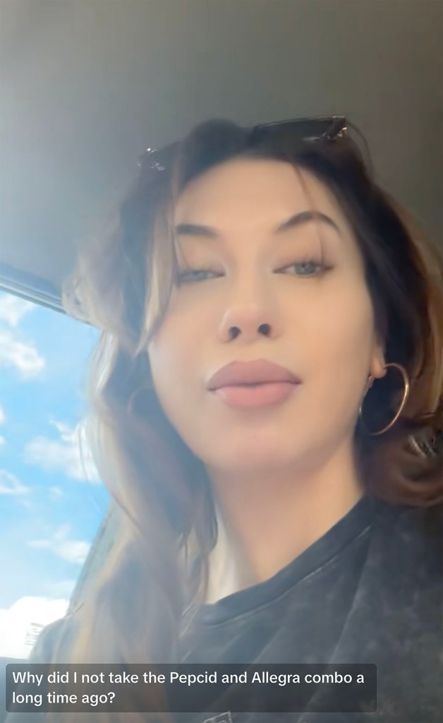 A woman in a car with text overlay "Why did I not take the Pepcid and Allegra combo a long time ago?"