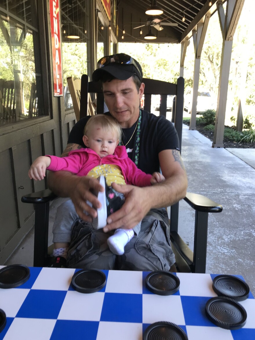 Richard Freshwater, 36, and his daughter in Tallahassee, where he drove her to safety ahead of Hurricane Ian in 2022.