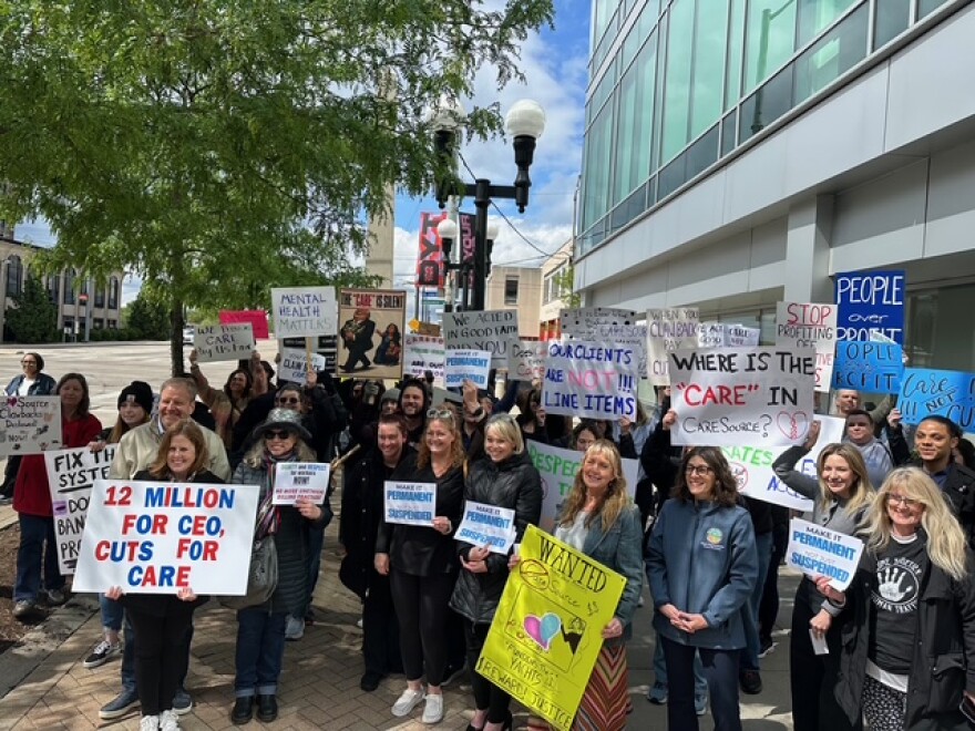 Behavioral health providers protest attempted recoupment policy outside of CareSource headquarters.