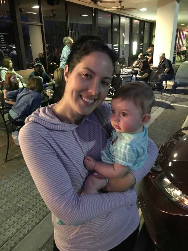 This image provided by Chris Carberg shows Jenna Carberg holding Elsie on April 30, 2017, in Winter Park, Fla. (Chris Carberg via AP) This image provided by Chris Carberg shows Jenna Carberg holding Elsie on April 30, 2017, in Winter Park, Fla. (Chris Carberg via AP)