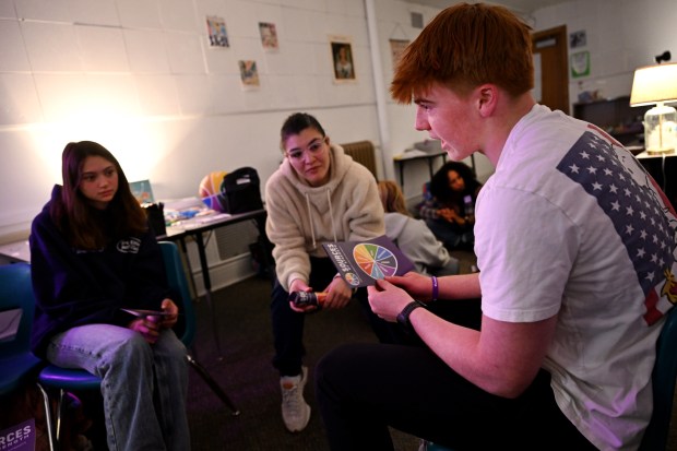 Dylan Vitale, 16, right, talks about his personal sources of strength in a breakout group with student engagement specialist Jenavi Sauceda, center, and student Jun Logue, 15, left, during the Sources of Strength workshop at South High School in Denver on March 19, 2025. (Photo by Helen H. Richardson/The Denver Post)