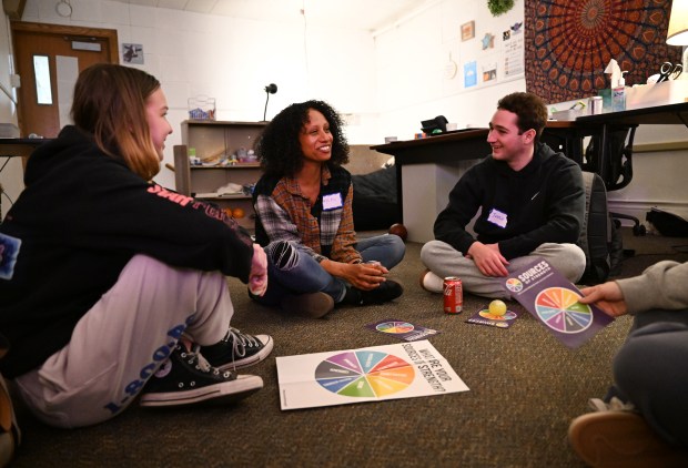 Teacher and mentor Neelah Ali, second from left, works with students Rose Negler, 17, left, Jesse Chapman, 17, second from right, and Reeve Pawlowski, 16, right, in a breakout group during Sources of Strength workshop at South High School in Denver on March 19, 2025. (Photo by Helen H. Richardson/The Denver Post)
