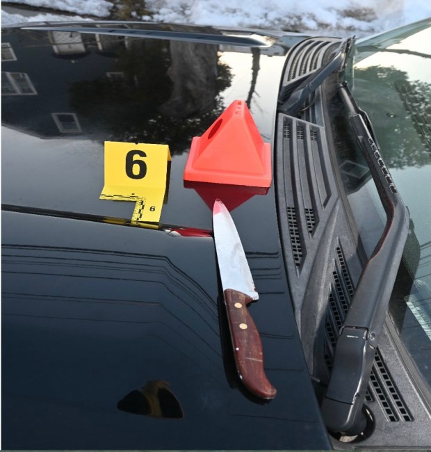 A photo of the knife Steven Jones carried on top of Officer Josue Charles' police cruiser following the shooting. (Courtesy of Office of Inspector General)